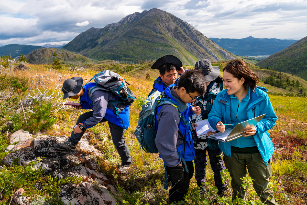 Students participate in a geology field school. Students like these are supported by Seisware's support, which provides them with industry software during their education.